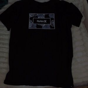 Im selling this Hurley shirt that’s black and is a women's size medium.